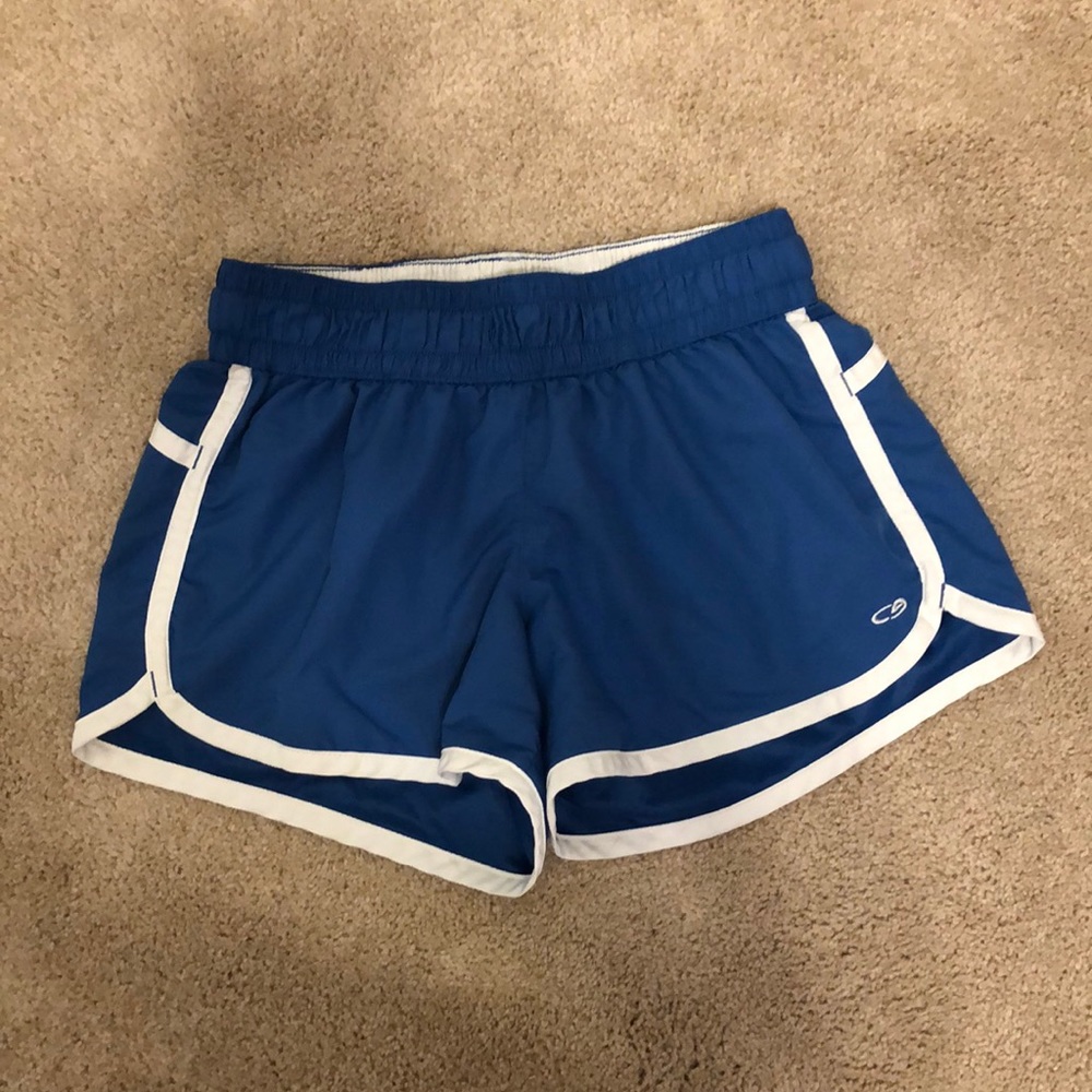Blue Champion athletic shorts with white piping